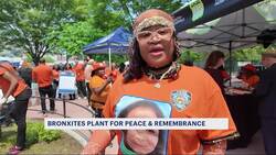 Family of gun violence victims plant flowers at St. Mary's Park News Clip