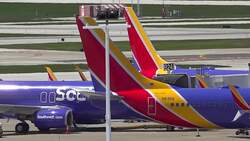 US travellers take airline masks in their stride Instructional Video