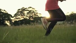 leg shot woman running slow motion sun light Stock Footage