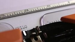 Close up footage of an old typewriter and a person writing EPILOGUE on it... Stock Footage