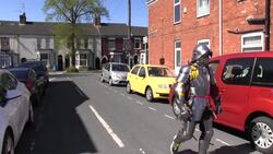 Man completes 10K run in back garden in suit of armour News Clip