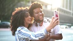 Young Couple Taking a Selfie Outdoors Stock Footage