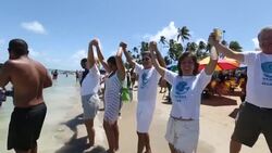 CLEAN : Brazilians hug the sea after oil spills News Clip