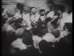Torah reading in Synagogue, Warsaw, 1942 Stock Footage