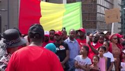 CLEAN : Supporters of Guinea's opposition coalition protest its dissolution in Brussels News Clip