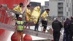 French coastguard rescues 94 people from water after small boat breaks apart News Clip