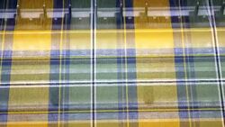 Colorful Threads on a loom in  weaving loom machine in textile factory Stock Footage