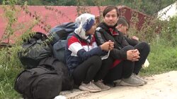 CLEAN : Migrant families camp in front of crowded reception centre in Bosnia News Clip