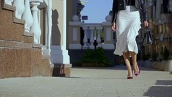 Beautiful female legs on a city street Stock Footage
