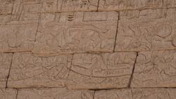 Egypt, Medinet Habu - Mortuary Temple of Ramesses III - Outer walls inscriptions Stock Footage