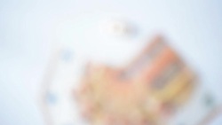 Wedding rings and banknotes focusing Stock Footage