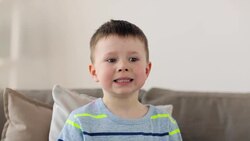 smiling little preteen boy at home Stock Footage