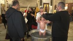 Five hundred infants baptized in a single ceremony Instructional Video