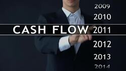 Cash flow for 2015, businessman selects financial report on virtual screen Stock Footage