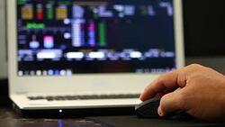 Using laptop trading stock exchange Stock Footage