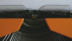 Close up footage of a person writing WORLD WAR III on an old typewriter Stock Footage