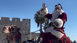 CLEAN : Palestinian Santa brings festive cheer to Jerusalem News Clip