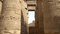 Karnak Temple in Luxor, Egypt. The Karnak Temple Complex, commonly known as Karnak, comprises a vast mix of decayed temples, chapels, pylons, and other buildings in Egypt. Stock Footage