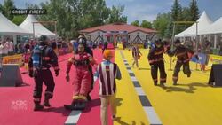 What happens when firefighters test their skills in competition? News Clip