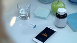 Mobile reminder time to taking medicine. Daily dose of medicaments Stock Footage