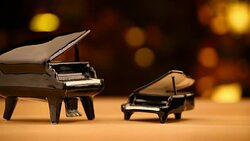 Black piano gold bokeh hd footage Stock Footage
