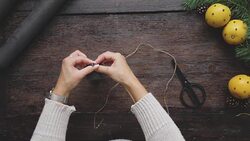 Swedish woman wrapping Christmas presents Stock Footage