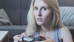 Girl playing video game Stock Footage