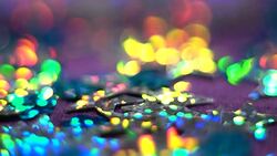 Silver glisten stars moving up. Abstract shiny background with bokeh. Christmas or holiday theme. HD Stock Footage