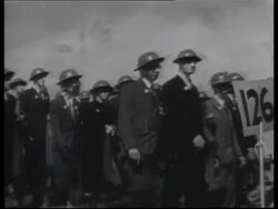 Britain reacts to the invasion of Poland, Neville Chamberlain, Winston Churchill, King George VI, conscription in UK, training, devastation in Poland Stock Footage