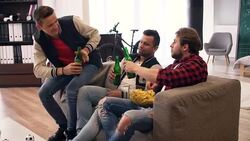 Football fans watching football match Stock Footage