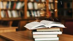 Open book with mathematical formulas flying off Stock Footage