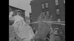 Floats in Winter Festival parade; speed skating winners William Carow and Kenneth Bartholomew; King Boreas News Clip