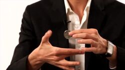 How to Do the Drop Coin Vanish Trick Instructional Video
