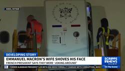 Emmanuel Macron's wife shoves his face News Clip