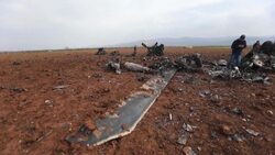 CLEAN : Syrians describe scene of US raid next to remains of devastated helicopter News Clip