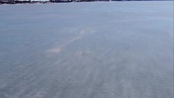 CLEAN : Ice surfers carve up Finland's frozen sea News Clip