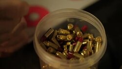 Slow motion target shooting on a firing range News Clip