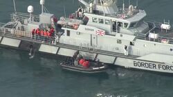 UK: UK Boarder Force vessel intercepting a migrant boat in the English Channel News Clip
