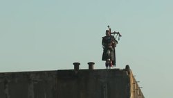 ROTY: DDAY: Lone Piper Salute News Clip