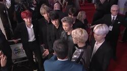 Agency for Korean band BTS issues apology for a member wearing T-shirt depicting explosion of an atomic bomb and a hat with a Nazi emblem Instructional Video