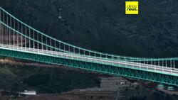World's tallest bridge opens to traffic in China's Guizhou province News Clip