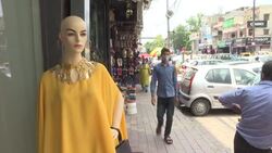 CLEAN : 'Cooped up' Indians throng markets and malls, weeks after Covid surge News Clip