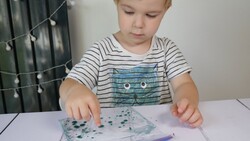 How to Make a Sensory Bag with Baby Oil Instructional Video
