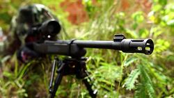 Slow Motion: Close-ups that snipers with guns to the mission on the mountain Stock Footage