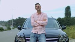 Portrait of successful businessman near car Stock Footage
