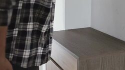 Young man going out Stock Footage