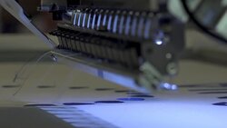 Automatic modern sewing machine embroider a pattern,Industrial embroidery equipment. Textile Manufacturers.Industrial textile factory,Textile Factory. Textile Industry. Stock Footage