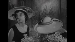 Hat models in floral shop in Paris, France, February 1955 News Clip