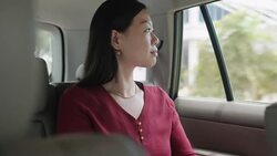 Busy Chinese Business Woman Working In Car Commuting To Work Stock Footage