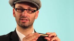 How to Play Notes on a Harmonica Instructional Video